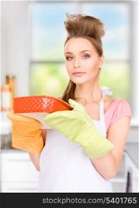 picture of beautiful cooking housewife in the kitchen