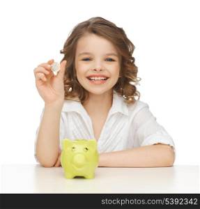 picture of beautiful girl with piggy bank