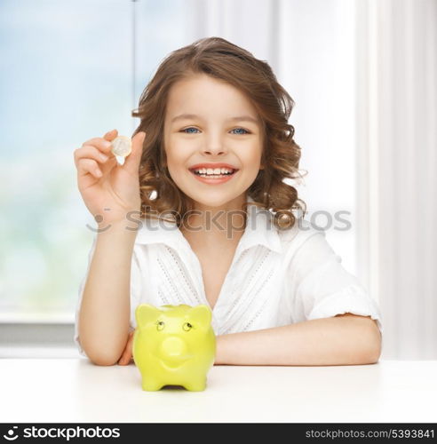 picture of beautiful girl with piggy bank