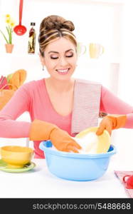 picture of beautiful housewife washing dish at the kitchen