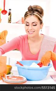 picture of beautiful housewife washing dish at the kitchen