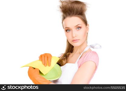 picture of beautiful housewife washing dish over white