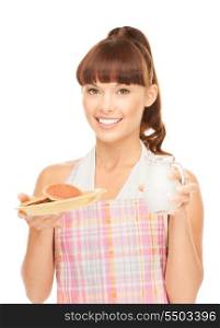 picture of beautiful housewife with milk and cookies&#xA;