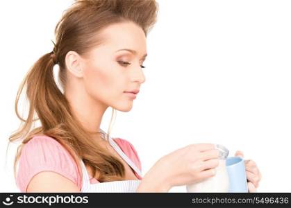 picture of beautiful housewife with milk and mug