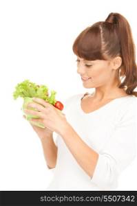 picture of beautiful housewife with vegetables over white