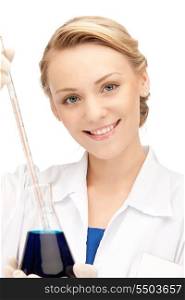 picture of beautiful lab worker holding up test tube