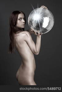 picture of beautiful naked woman with disco ball