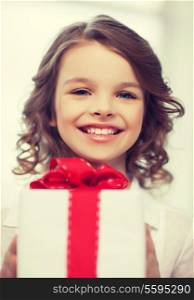 picture of beautiful pre-teen girl with gift box