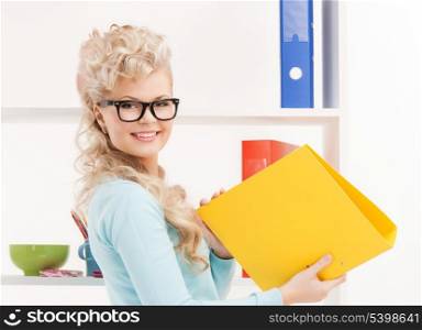 picture of beautiful smiling woman with folder