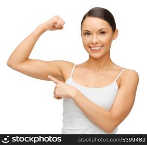 picture of beautiful sporty woman flexing her biceps