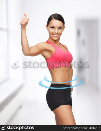 picture of beautiful sporty woman showing thumbs up