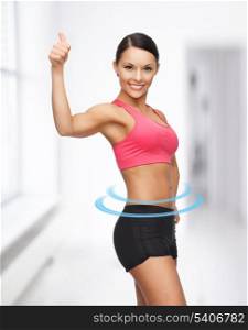 picture of beautiful sporty woman showing thumbs up
