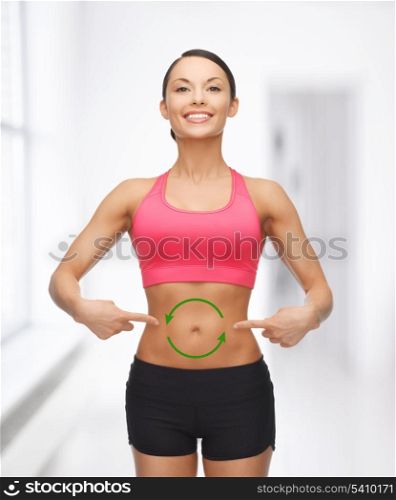 picture of beautiful sporty woman with arrows on her stomach