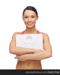 picture of beautiful sporty woman with scale