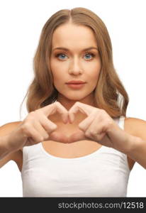 picture of beautiful woman forming heart shape