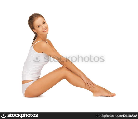 picture of beautiful woman in cotton undrewear touching her legs