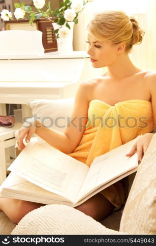 picture of beautiful woman in spa salon with book