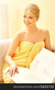 picture of beautiful woman in spa salon with book