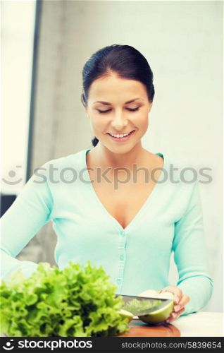 picture of beautiful woman in the kitchen.. beautiful woman in the kitchen