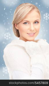 picture of beautiful woman in white sweater.