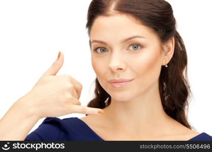 picture of beautiful woman making a call me gesture