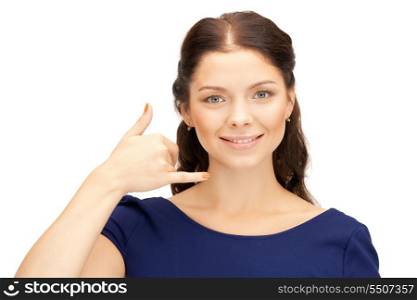 picture of beautiful woman making a call me gesture
