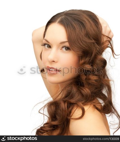 picture of beautiful woman playing with long hair