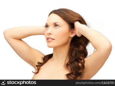 picture of beautiful woman playing with long hair