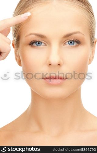 picture of beautiful woman pointing to forehead