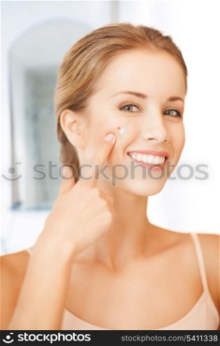 picture of beautiful woman pointing to nose
