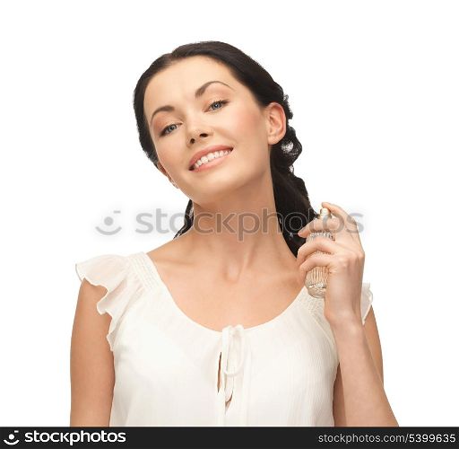 picture of beautiful woman spraying pefrume on her neck