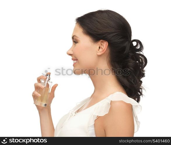 picture of beautiful woman spraying perfume on her neck