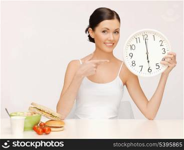 picture of beautiful woman with big clock