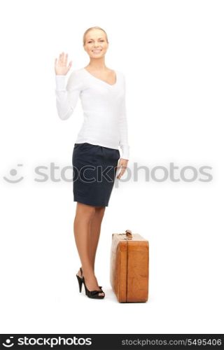 picture of beautiful woman with brown suitcase