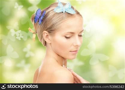 picture of beautiful woman with butterfly in hair