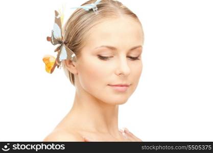 picture of beautiful woman with butterfly in hair