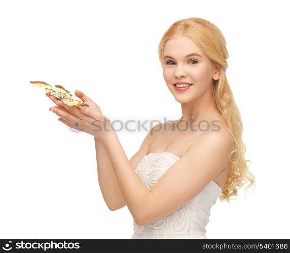 picture of beautiful woman with butterfly in hand