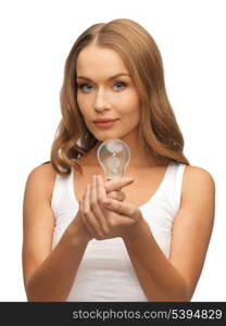 picture of beautiful woman with energy saving bulb