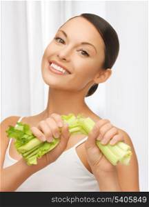 picture of beautiful woman with fresh celery