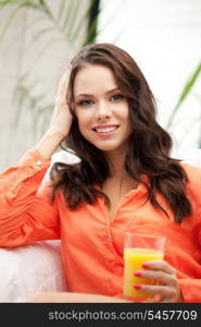 picture of beautiful woman with glass of juice