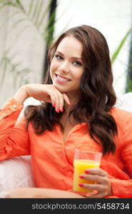 picture of beautiful woman with glass of juice