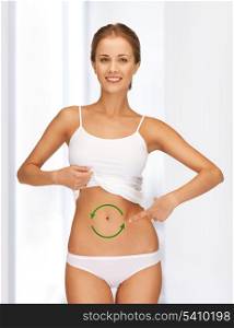 picture of beautiful woman with green arrows on her stomach