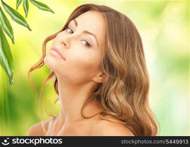 picture of beautiful woman with green leaves