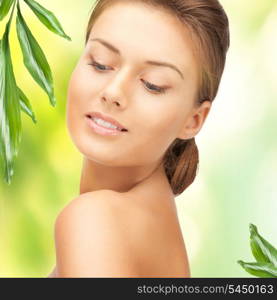 picture of beautiful woman with green leaves