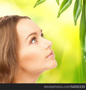 picture of beautiful woman with green leaves