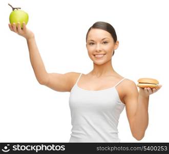 picture of beautiful woman with hamburger and apple