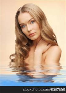 picture of beautiful woman with long hair in water