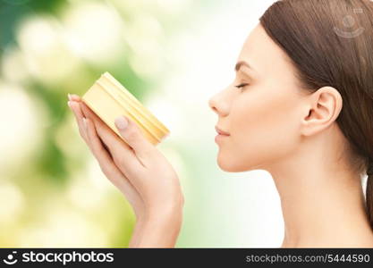 picture of beautiful woman with moisturizing creme