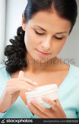 picture of beautiful woman with moisturizing creme