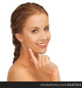 picture of beautiful woman with moisturizing creme drop.